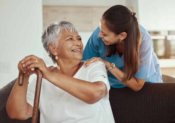 Adult caring for senior at home