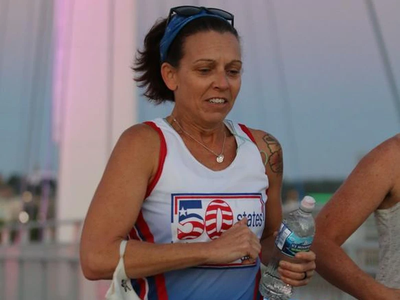 Judy Taveira running a marathon.