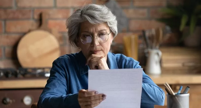 Middle aged woman worried about costs of assisted living