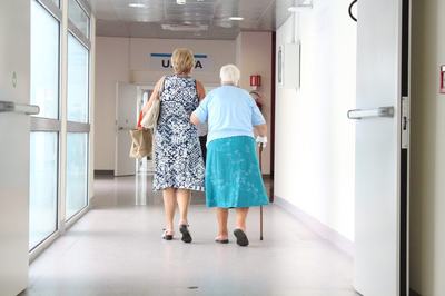 Female senior leaving the hospital